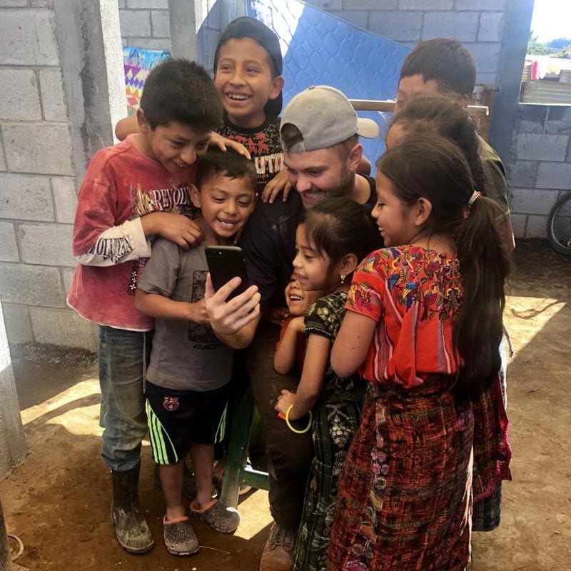 Paul with local kids in Guatemala